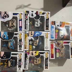 Funko Pop Vinyl Figures with Blue, Black, and White Accents
